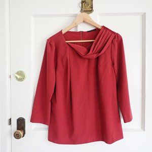 Sisley blush-colored blouse